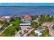 Aerial view showing waterfront property, pool, and parking at 53 W Bay Heights Rd # 205, Englewood, FL 34223