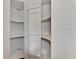 Large walk-in closet with shelving and rods at 53 W Bay Heights Rd # 205, Englewood, FL 34223