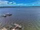 Waterfront boat docks with several boats at 53 W Bay Heights Rd # 205, Englewood, FL 34223