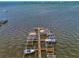 Aerial view of multiple boat slips and docks at 53 W Bay Heights Rd # 205, Englewood, FL 34223