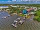 Aerial view of waterfront property with boat slips at 53 W Bay Heights Rd # 205, Englewood, FL 34223