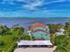 Aerial view of waterfront property with pool and parking at 53 W Bay Heights Rd # 205, Englewood, FL 34223
