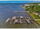 Waterfront property with multiple boat slips and docks at 53 W Bay Heights Rd # 205, Englewood, FL 34223