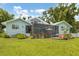 Large backyard with hot tub and spacious lawn at 1730 Padre Ln, Englewood, FL 34223