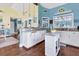 Open concept kitchen with granite countertops and a breakfast bar at 1730 Padre Ln, Englewood, FL 34223