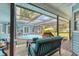 Screened pool and deck with seating area at 1730 Padre Ln, Englewood, FL 34223