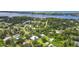 Aerial view of neighborhood with water access at 1730 Padre Ln, Englewood, FL 34223