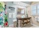 Bathroom with glass vessel sink and a tropical shower curtain at 1730 Padre Ln, Englewood, FL 34223