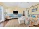 Spacious main bedroom with a king-size bed and access to a patio at 1730 Padre Ln, Englewood, FL 34223