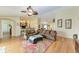 Open living room with hardwood floors and comfortable seating at 14143 Saul Ln, Port Charlotte, FL 33981
