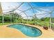 Enjoy this refreshing screened pool at 14143 Saul Ln, Port Charlotte, FL 33981