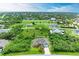 Aerial view of house and surrounding area at 14143 Saul Ln, Port Charlotte, FL 33981