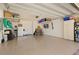 Organized garage with overhead storage and ample space at 1012 Bradberry Dr, Nokomis, FL 34275
