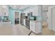 Modern kitchen with stainless steel appliances and light blue cabinets at 10168 Willowood Ave, Englewood, FL 34224