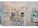 Modern white kitchen with large island and ample storage at 10136 Amy Ter, Port Charlotte, FL 33981