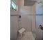 Large walk-in shower with built-in seating and rainfall shower head at 10136 Amy Ter, Port Charlotte, FL 33981