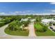 Bird's eye view of a single Gathering home with palm trees at 200 Capstan Dr, Placida, FL 33946