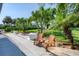 Relaxing patio with wooden chairs overlooking the canal at 200 Capstan Dr, Placida, FL 33946