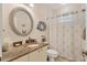 Guest bathroom with granite countertop, single sink and shower/tub combo at 200 Capstan Dr, Placida, FL 33946