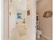 Bathroom with a bathtub, toilet, and additional storage at 200 Capstan Dr, Placida, FL 33946