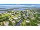 Aerial view of waterfront community with lush landscaping at 200 Capstan Dr, Placida, FL 33946