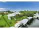 Waterfront property with lush landscaping at 200 Capstan Dr, Placida, FL 33946