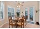 Charming dining area with wood table and chairs, perfect for Gathering meals at 200 Capstan Dr, Placida, FL 33946