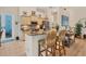 Open kitchen with granite counters, stainless steel appliances, and island at 200 Capstan Dr, Placida, FL 33946