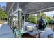Covered boat lift with a large motor at 200 Capstan Dr, Placida, FL 33946