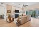 Spacious living room with hardwood floors and fireplace at 200 Capstan Dr, Placida, FL 33946