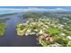 Wide aerial showcasing waterfront community at 200 Capstan Dr, Placida, FL 33946