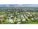 Aerial view showcasing a neighborhood's waterfront location at 200 Capstan Dr, Placida, FL 33946