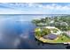 Waterfront home boasts mature trees with water views, including a private dock at 3058 Mauck Ter, Port Charlotte, FL 33981