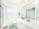 Bathroom with shower, toilet and vanity at 9 Medalist Pl, Rotonda West, FL 33947