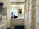 Clean bathroom with a white vanity and updated fixtures at 208 Marlette Dr, North Port, FL 34287