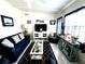 Furnished living room with TV and decor at 208 Marlette Dr, North Port, FL 34287