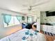 Main bedroom with a queen bed and mirrored closet at 208 Marlette Dr, North Port, FL 34287