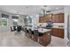 Spacious kitchen boasts granite countertops and ample cabinet space at 283 Long Meadow Ln, Rotonda West, FL 33947