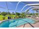 Inviting screened pool and patio area, perfect for relaxation at 283 Long Meadow Ln, Rotonda West, FL 33947