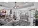 Bright and airy living room featuring comfortable seating and a spacious layout at 283 Long Meadow Ln, Rotonda West, FL 33947
