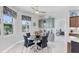 Casual dining area with table and chairs, offering views to backyard at 283 Long Meadow Ln, Rotonda West, FL 33947