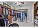 Large walk-in closet with ample shelving and hanging space at 283 Long Meadow Ln, Rotonda West, FL 33947