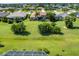 Aerial view of the house, showcasing its location in a quiet residential neighborhood at 283 Long Meadow Ln, Rotonda West, FL 33947