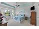 Spacious main bedroom with high ceilings, large windows, and a relaxing atmosphere at 283 Long Meadow Ln, Rotonda West, FL 33947