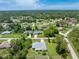 Aerial view of a single Gathering home with a large backyard and a quiet neighborhood at 5332 Ulysses St, Port Charlotte, FL 33981