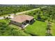 Aerial view showcasing home's location and backyard at 191 Brig W Cir, Placida, FL 33946