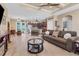 Living room with an open floor plan and a view into the kitchen and dining area at 191 Brig W Cir, Placida, FL 33946