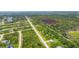 Wide aerial view of homes and undeveloped land at 191 Brig W Cir, Placida, FL 33946