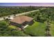 Aerial view of a single-story house with a large backyard at 191 Brig W Cir, Placida, FL 33946