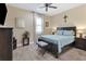 Guest bedroom with a queen-size bed and window with shutters at 191 Brig W Cir, Placida, FL 33946